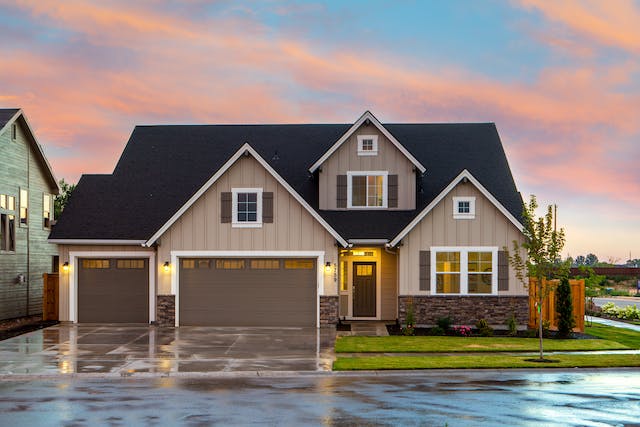 A front view of a beautiful brown home.