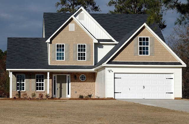 A beautiful white brown house.