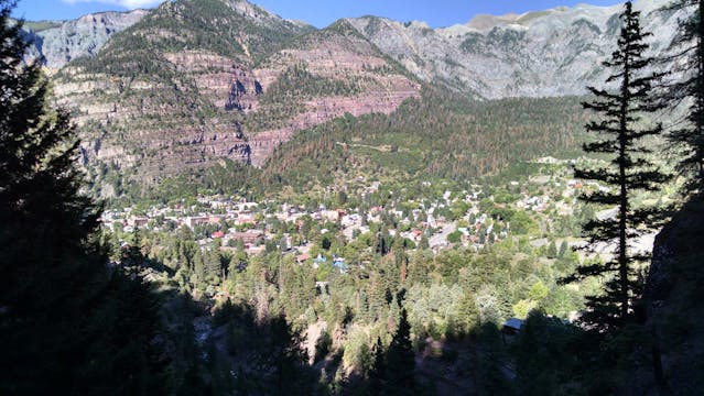 A neighborhood situated between mountains.