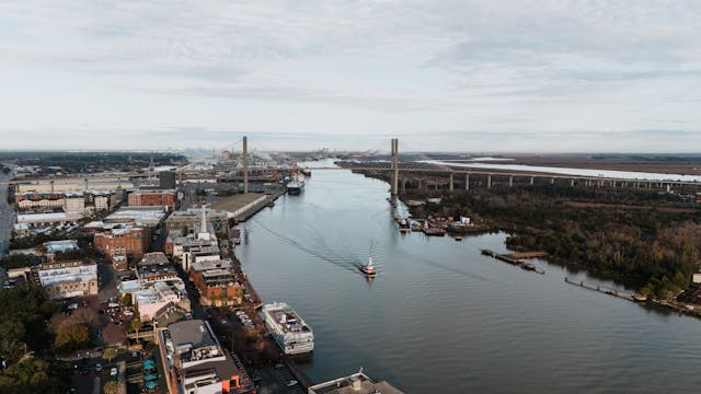 An aerial view of the river and nearby towns.