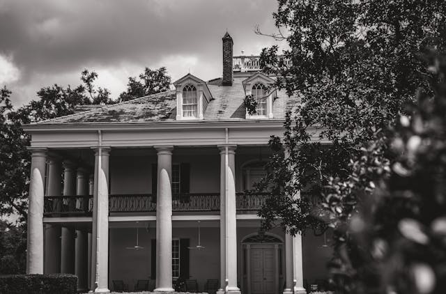 An old style house in black and white.