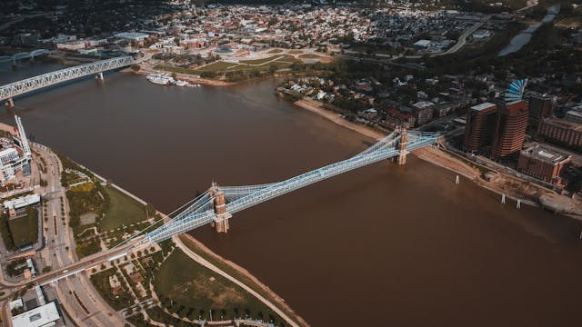 A bird's eye view of a city and a bridge.